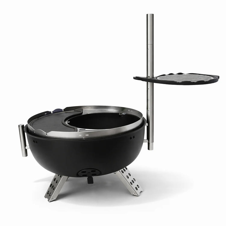 Black portable fire pit with stand on a white background