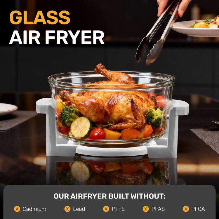 Glass air fryer with roasted chicken and vegetables, featuring text about materials used.