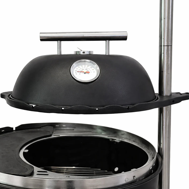 Black barbecue grill with a thermometer on a white background