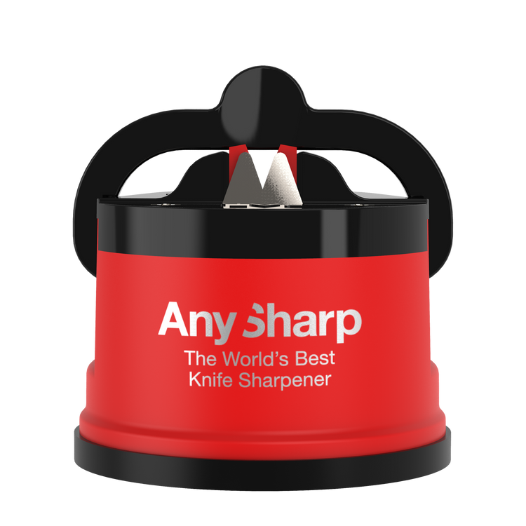 AnySharp Pro Knife Sharpener with a red and black color scheme, attached to a suction cup, being used to sharpen a knife over a kitchen counter.