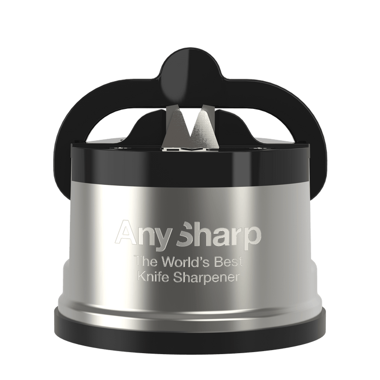 AnySharp Pro Knife Sharpener with a red and black color scheme, attached to a suction cup, being used to sharpen a knife over a kitchen counter.