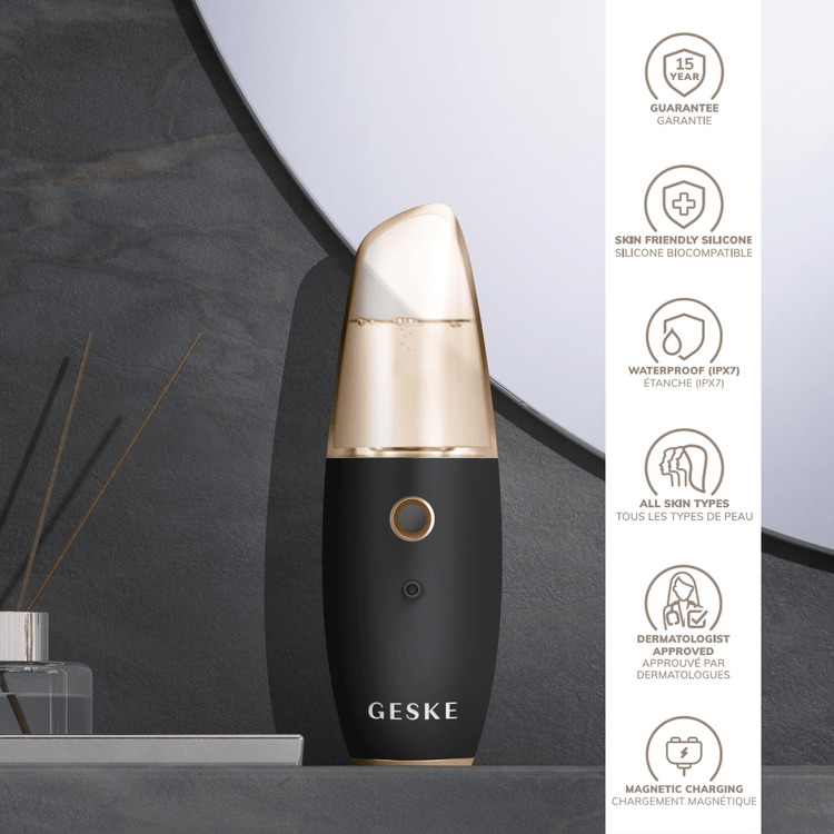 Black and gold beauty device withGESKE branding on a gray surface.