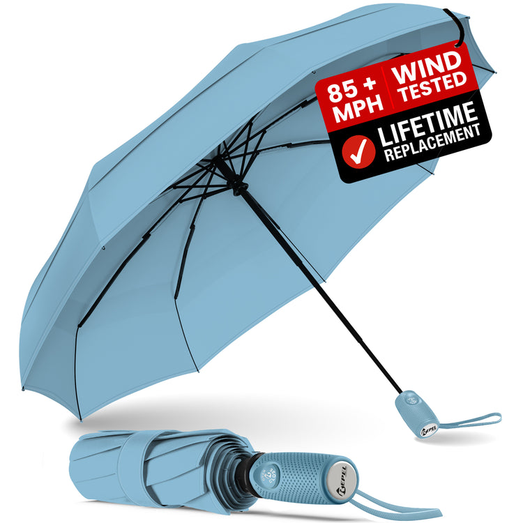 Light blue umbrella with wind resistance feature on a white background