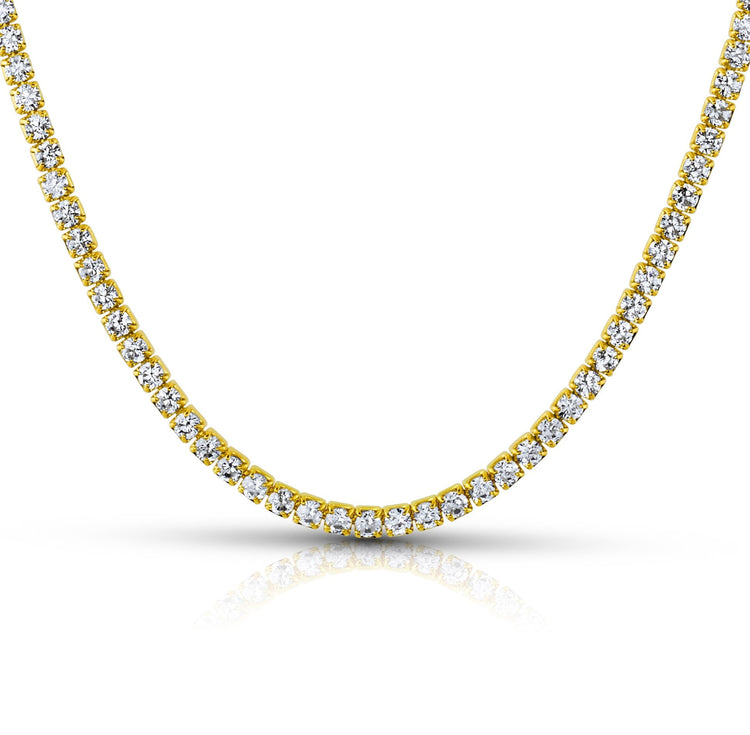 Gold necklace with diamonds on a white background