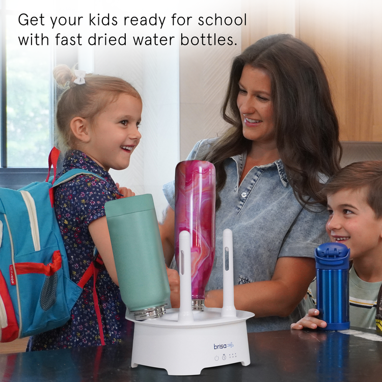 Woman and children with water bottles and a charging station, promoting fast-drying water bottles.