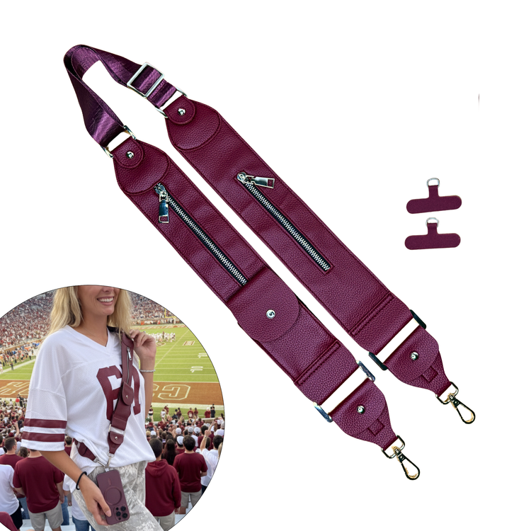 Maroon guitar strap with additional clips on a white background