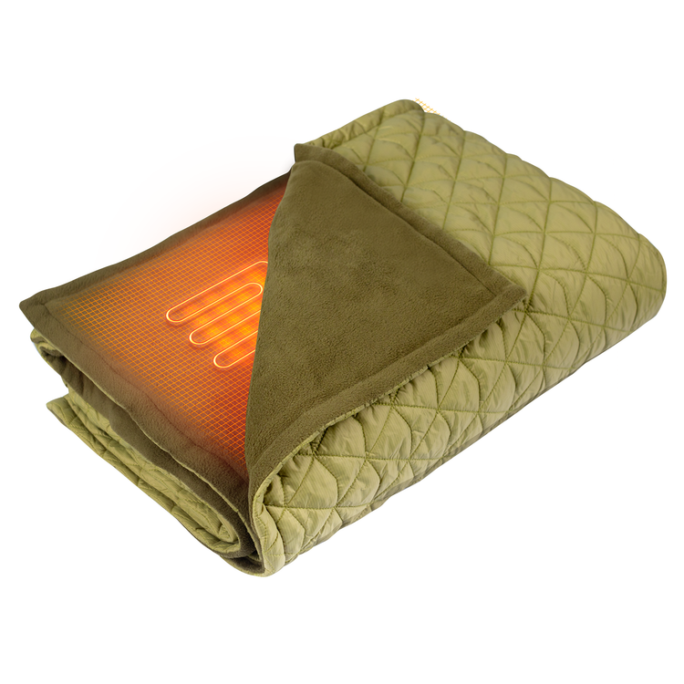 Folded green heating pad with glowing interior on a white background