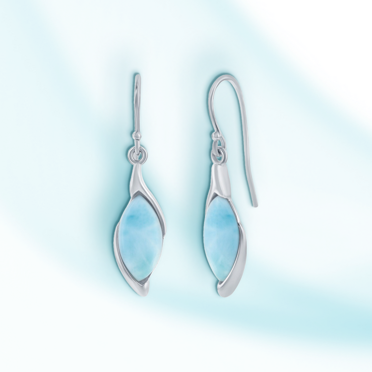 A pair of sterling silver marquise-shaped larimar earrings with French wire closures, displayed against a light blue background.