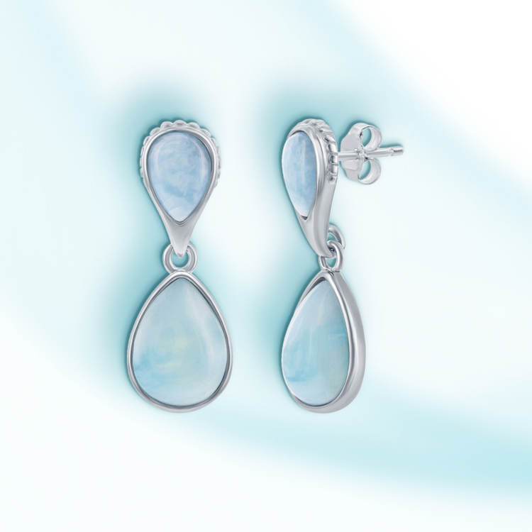A pair of sterling silver earrings featuring two pear-shaped Larimar stones.
