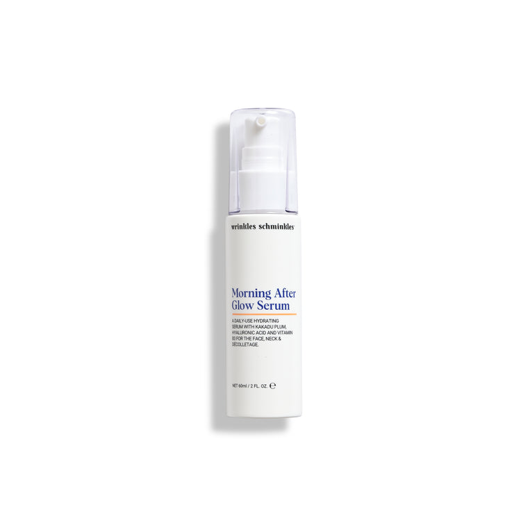 A white pump bottle with blue and green label text, indicating it is a skincare product called 'Morning After Glow Serum'.