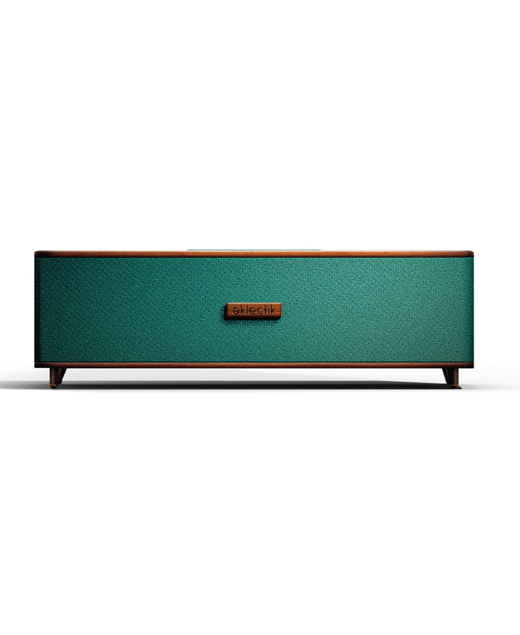 Teal rectangular speaker with wooden accents on a white background