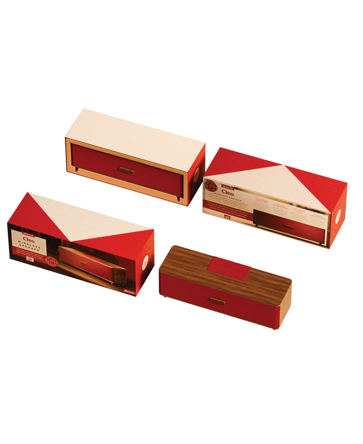 Four wooden boxes with red and beige designs on a white background