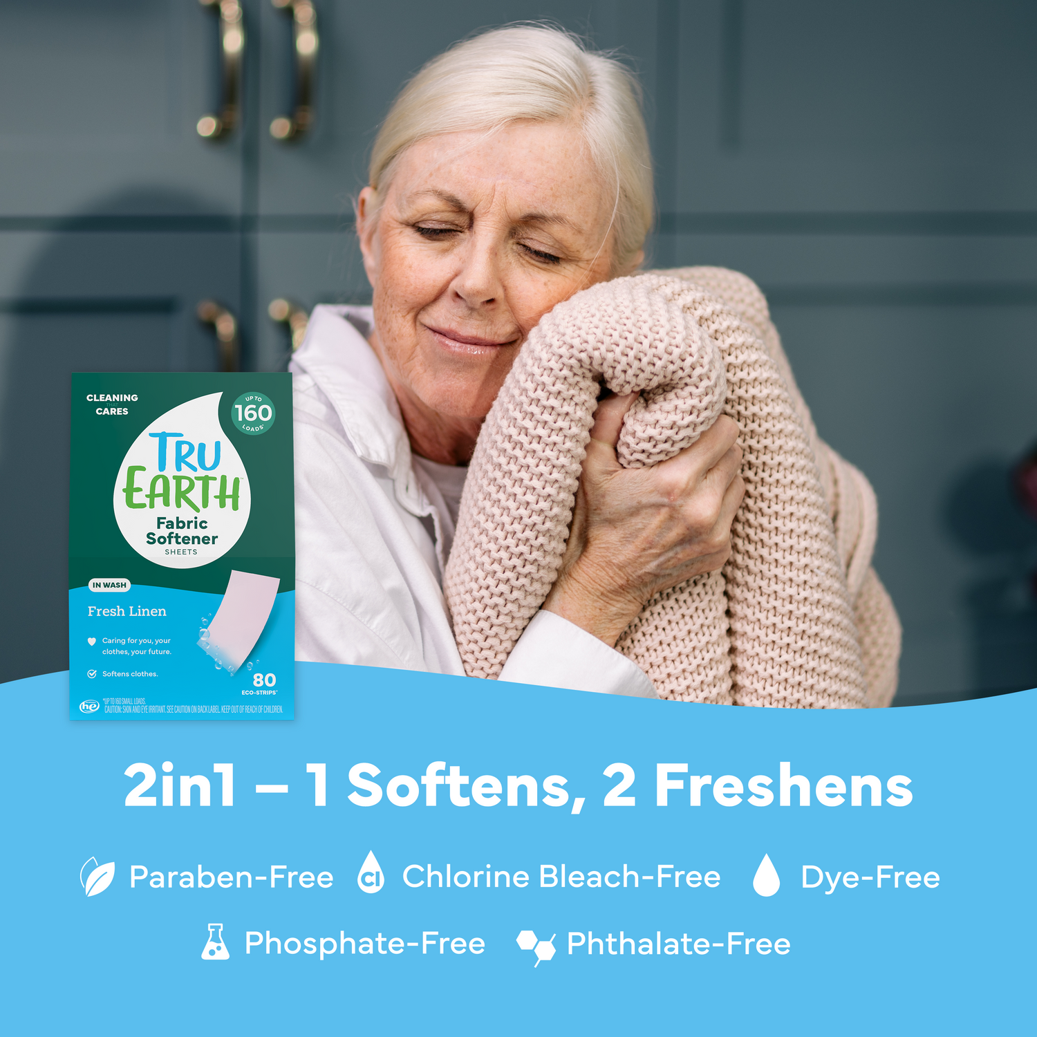 Woman holding a pink blanket with Tru Earth fabric softener packaging displayed.