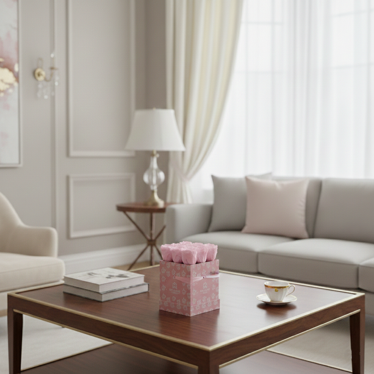 Living room with a gray sofa, wooden coffee table, and decorative items.