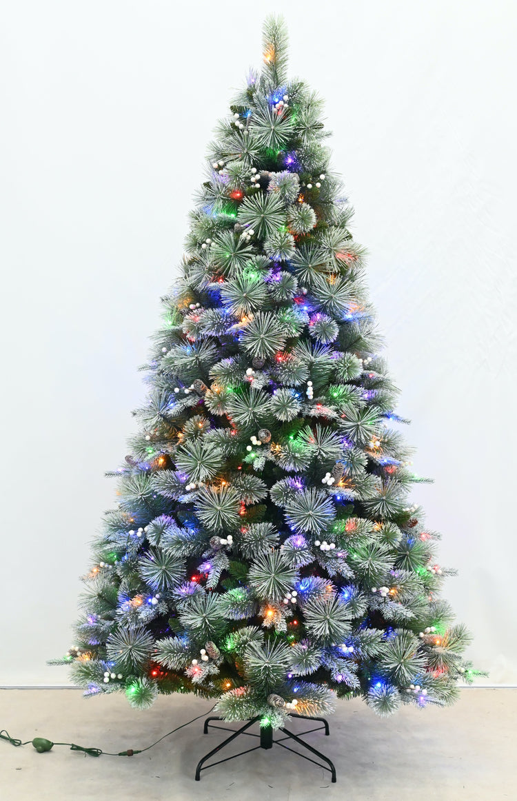 Decorated Christmas tree with lights on a white background