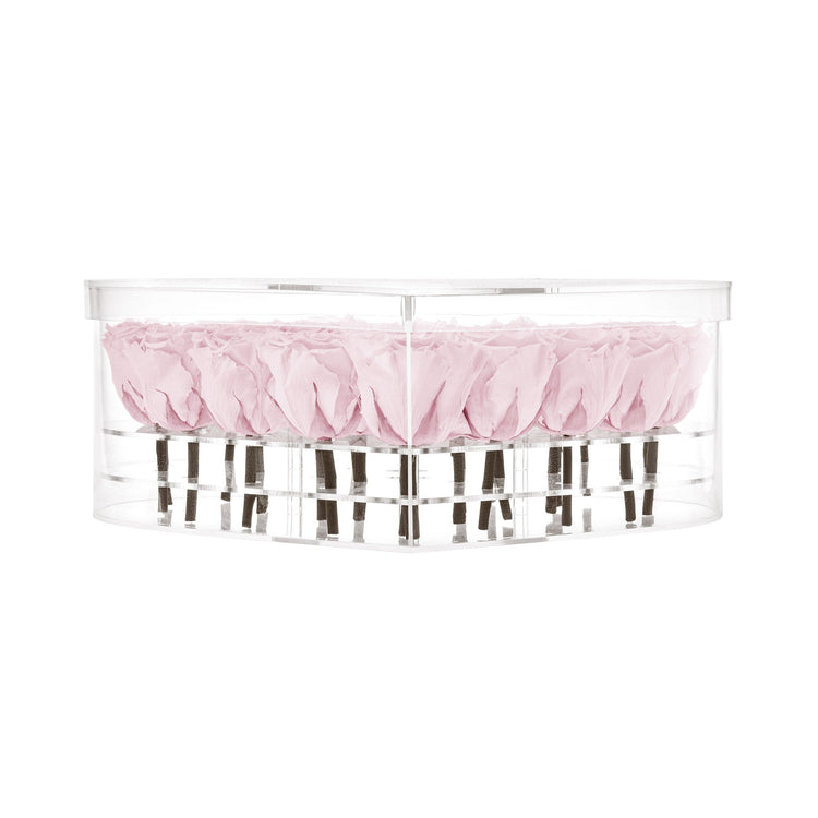 Clear plastic container with pink fabric inside on a white background