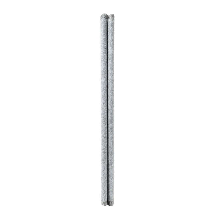 Two metallic cylindrical objects on a white background