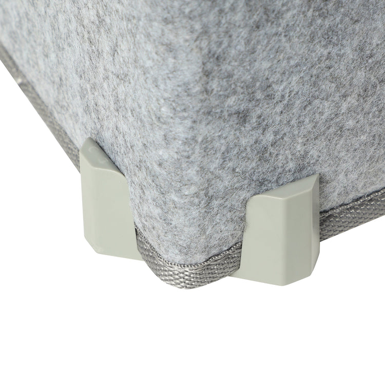 Gray felt board with white corner clips on a white background