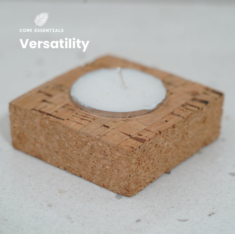 Cork candle holder with a candle on a light gray background, featuring the brand 'Cork Essentials'.