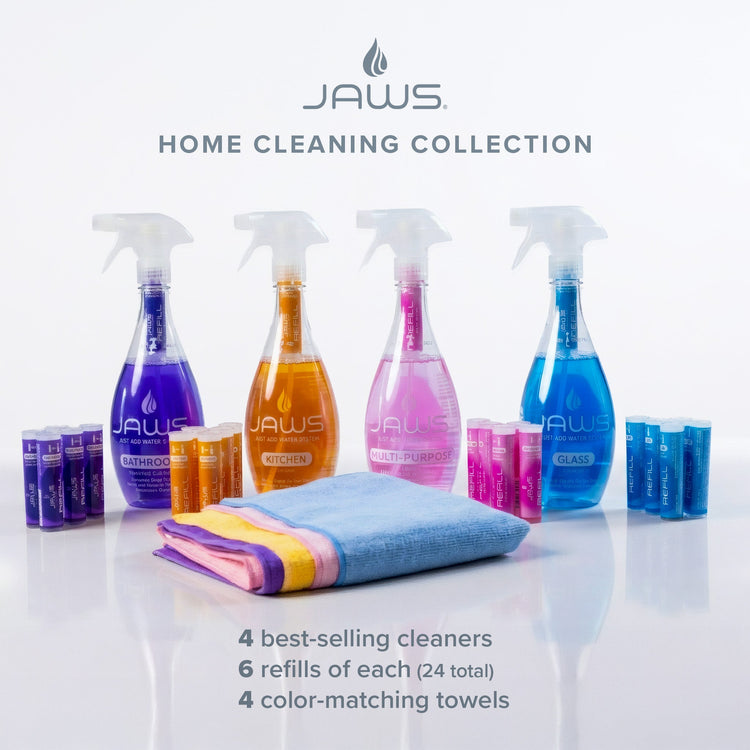 JAWS home cleaning collection with spray bottles and towels on a white background