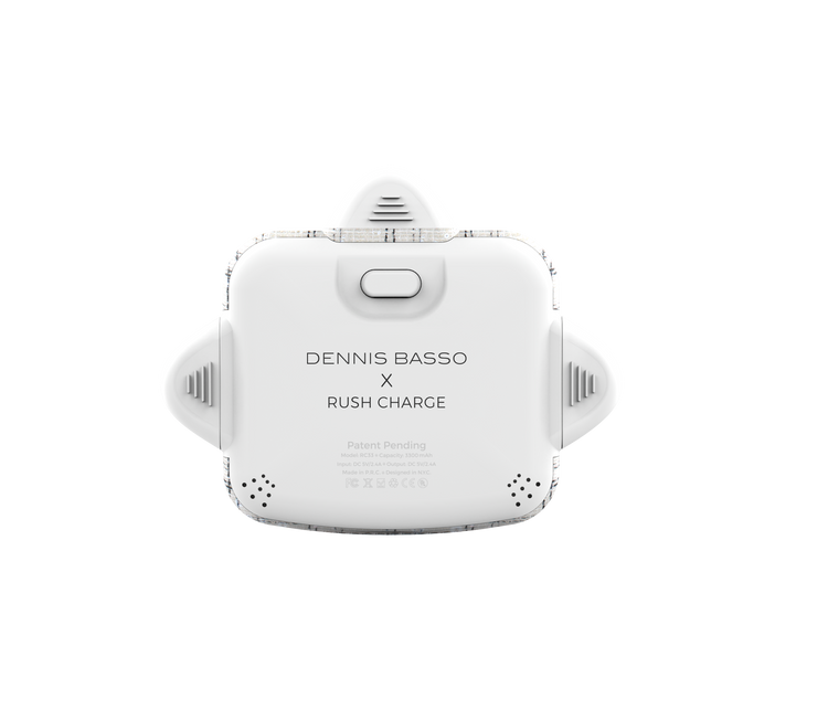 White electronic device with 'Dennis Basso x Rush Charge' text on a white background