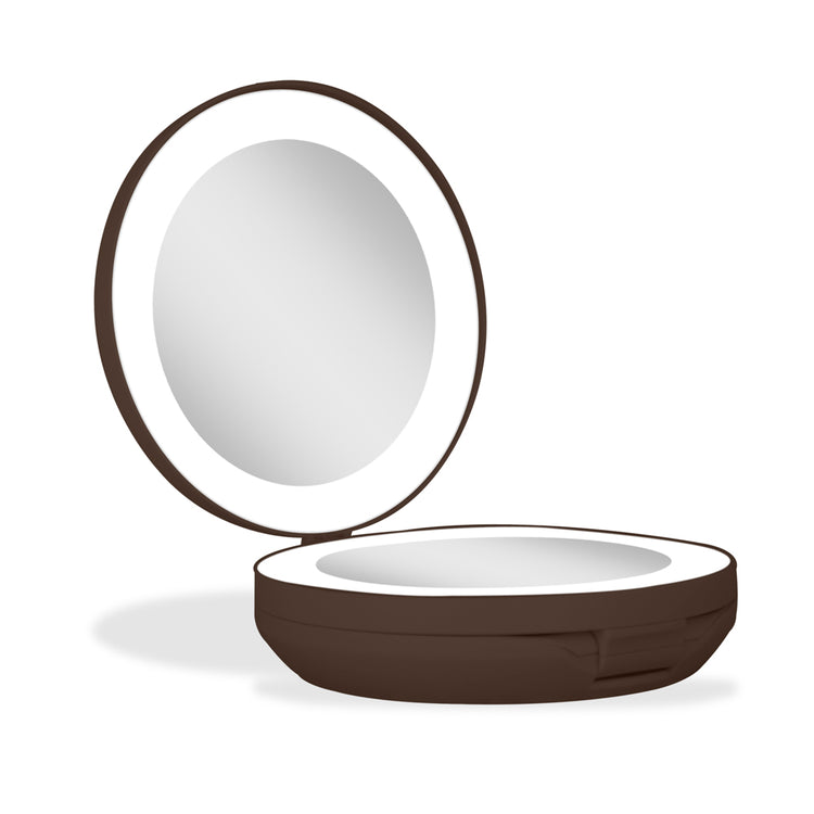 Compact mirror with brown frame on a white background