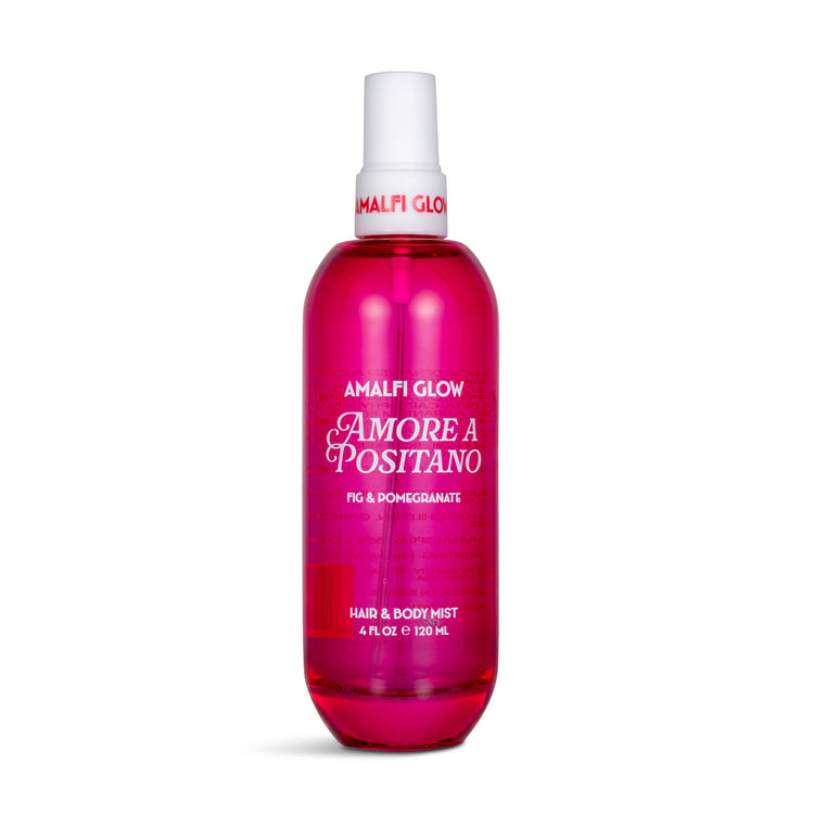 Pink bottle of Amore a Positano hair and body mist on a white background