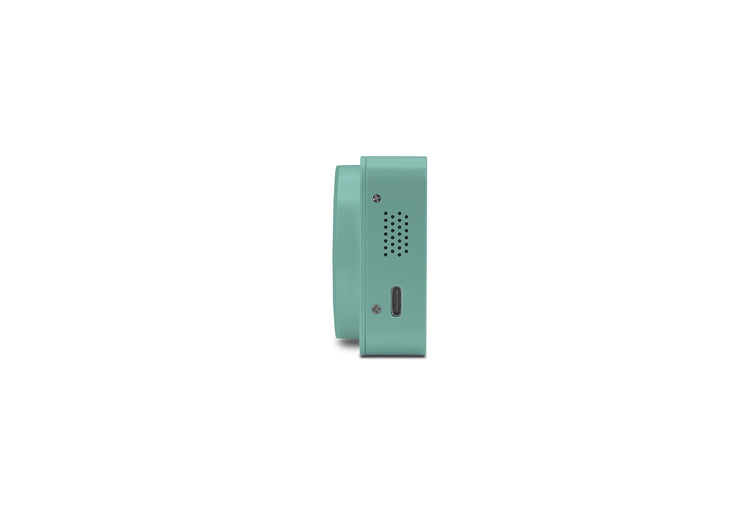 Teal doorbell on a white background