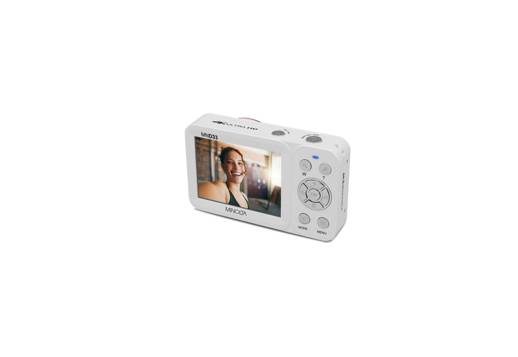 Digital camera with a screen displaying a person's face on a white background