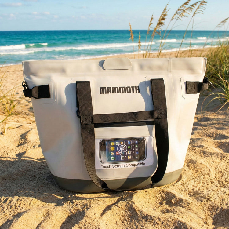 Mammoth cooler bag on a sandy beach with ocean in the background