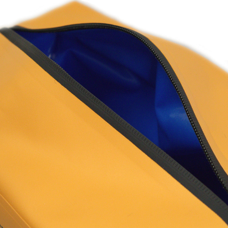 Close-up of a yellow bag with a blue interior