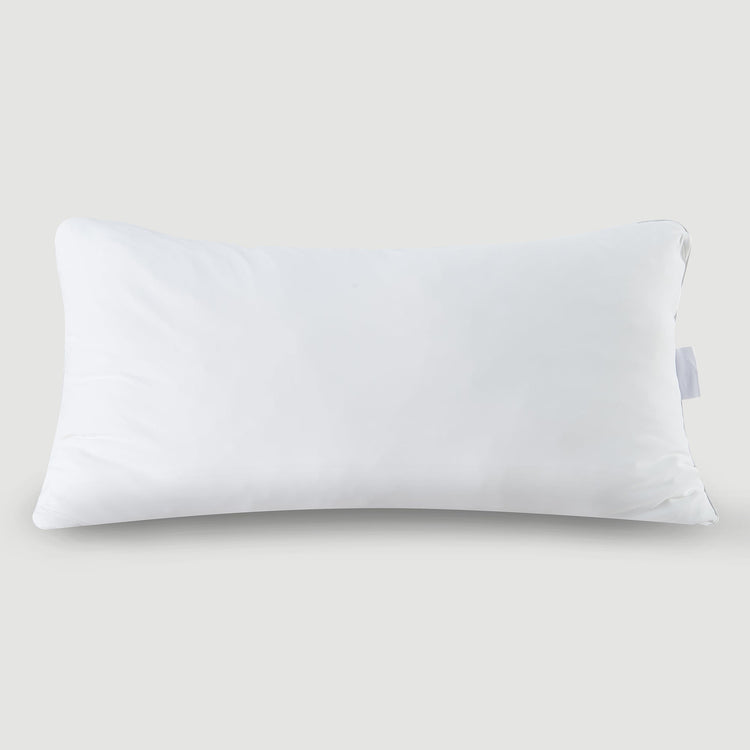White pillow on a light gray background