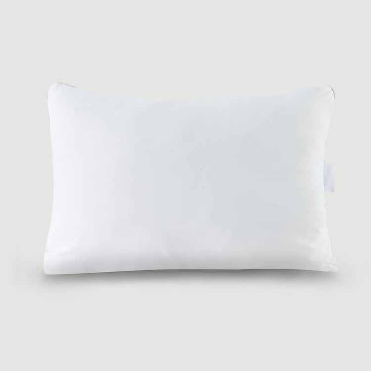White pillow on a light gray background