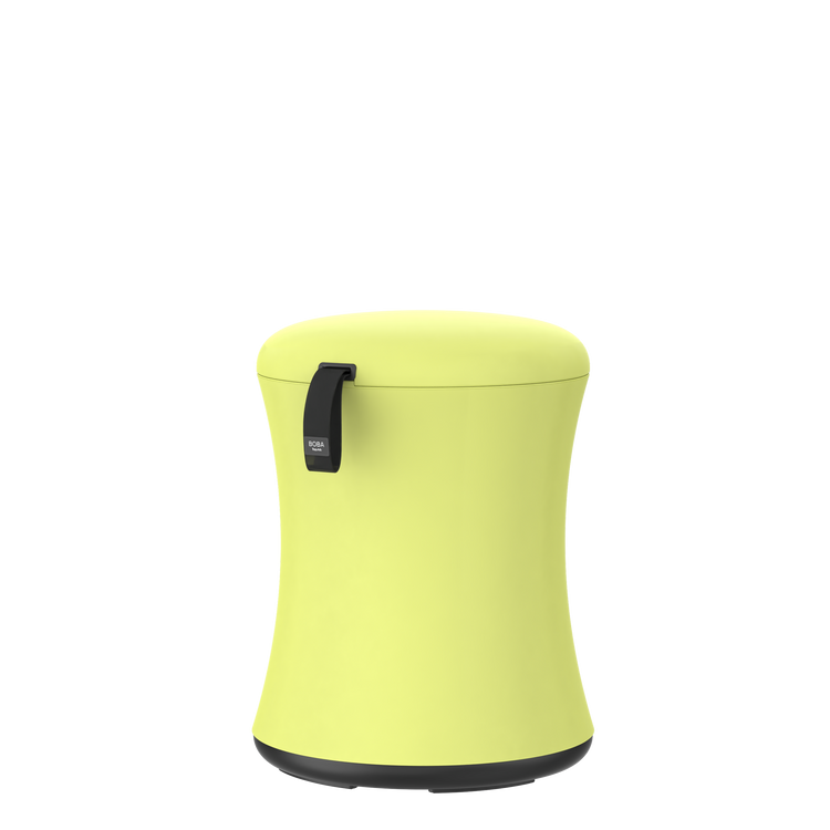 Yellow baby bootie with a black strap on a white background