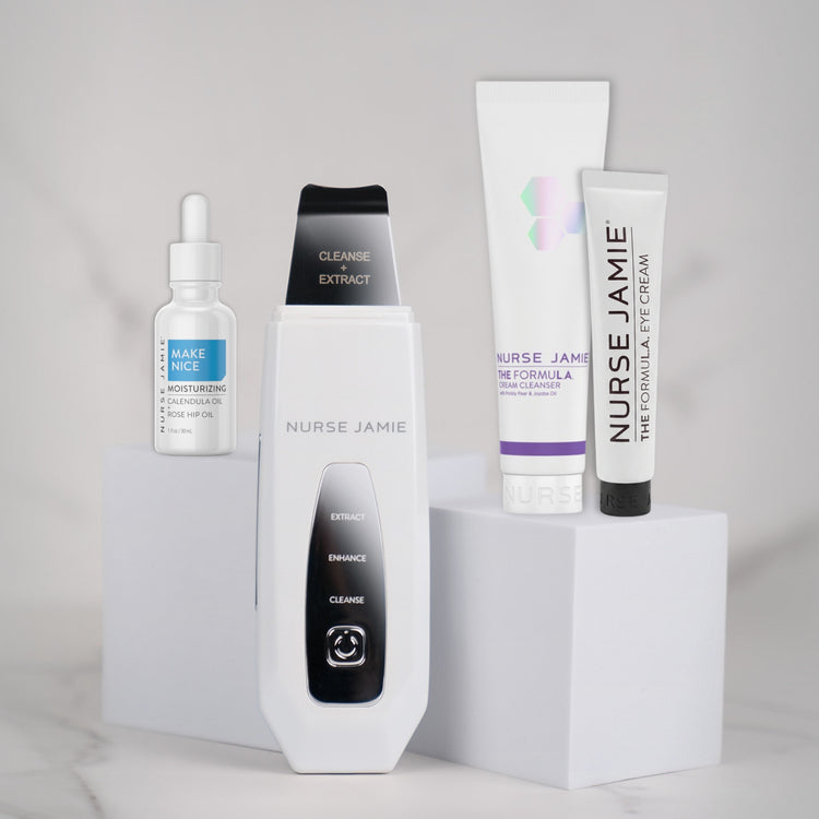 Collection of Nurse Jamie skincare products on a gray background