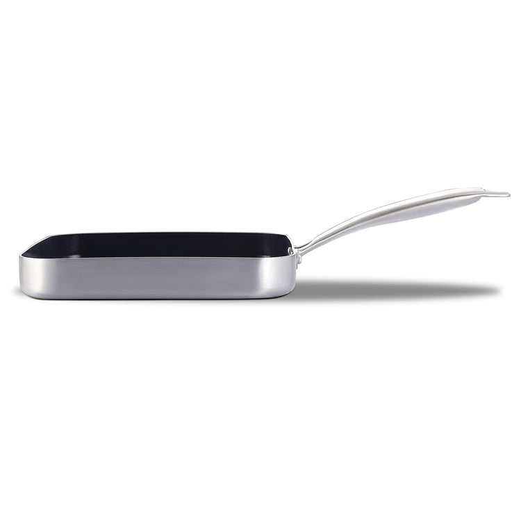Stainless steel frying pan on a white background