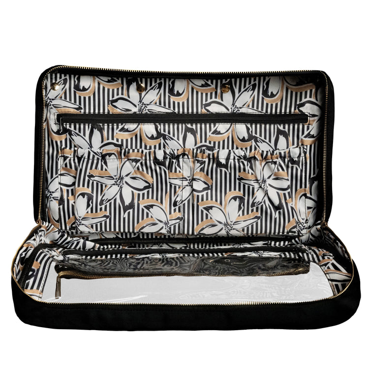 Floral patterned clutch bag on a white background