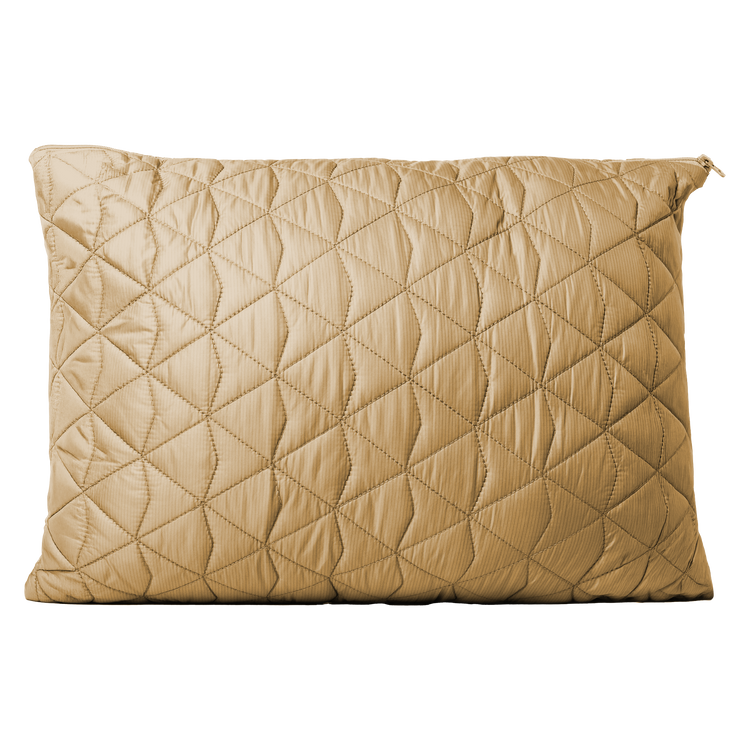 Beige quilted pillow on a white background