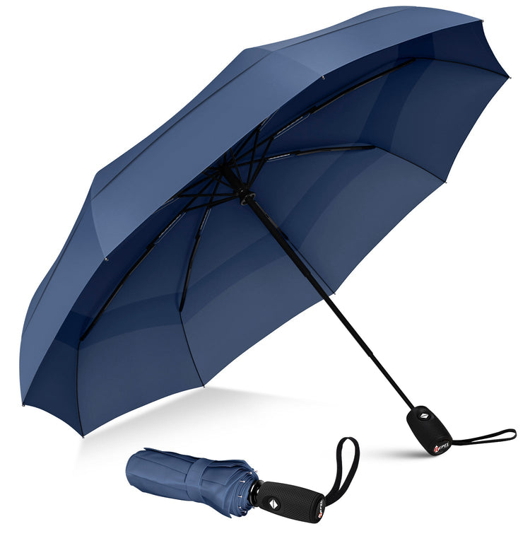 Blue umbrella with black handle and strap on a white background