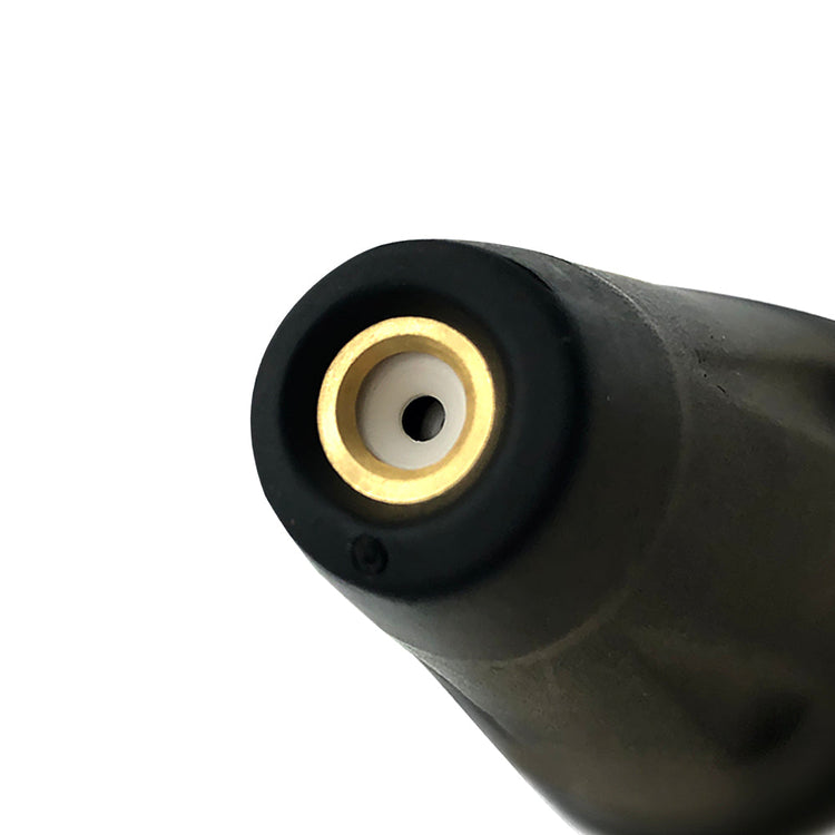 Close-up of a black and gold nozzle on a white background