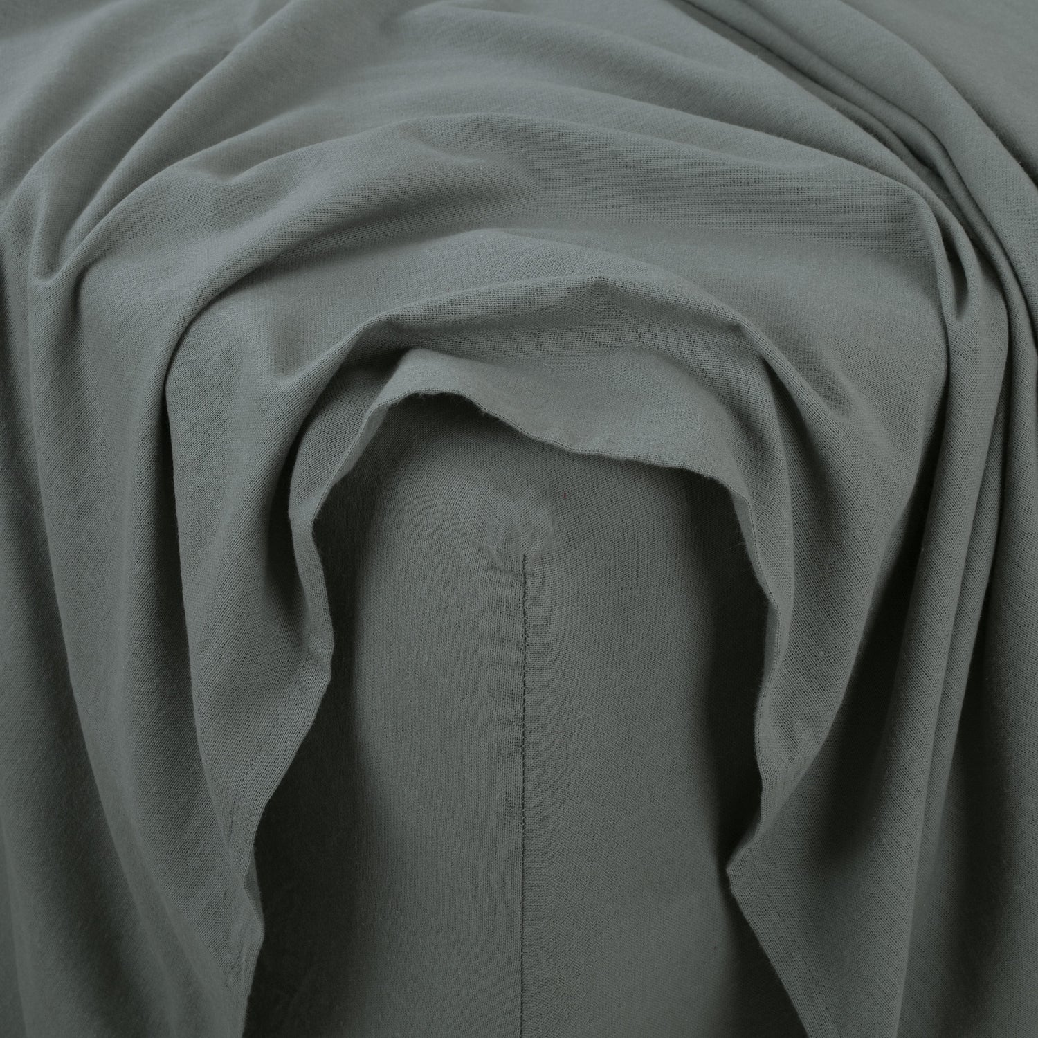 Close-up of gray fabric with folds
