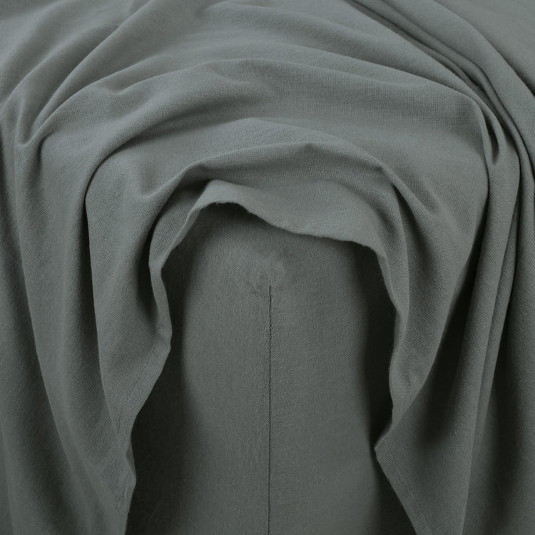 Close-up of gray fabric with folds