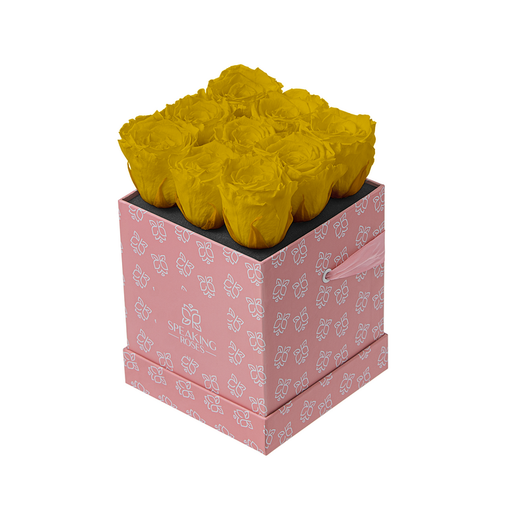 Pink box with yellow flowers on a white background