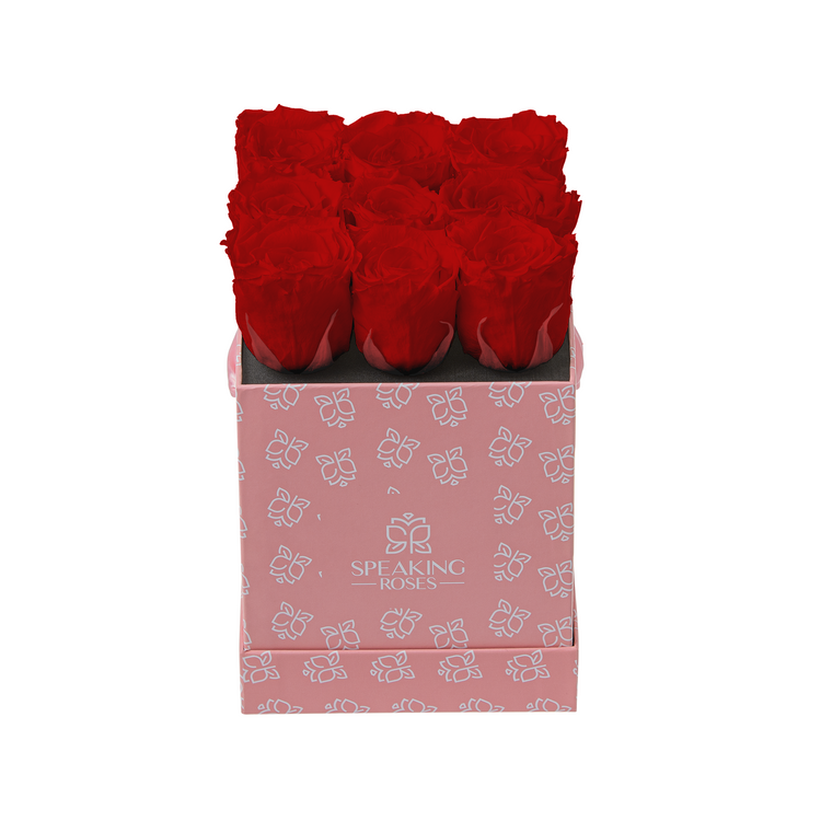 Pink box with red roses and 'Speaking Roses' branding on a white background