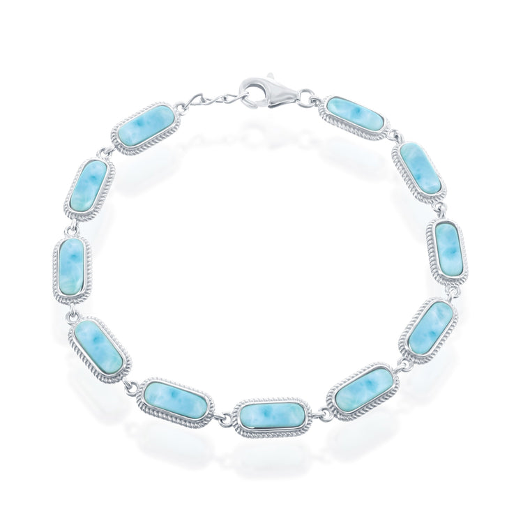 A sterling silver bracelet with oval linked chains and blue larimar stones, featuring a clasp.