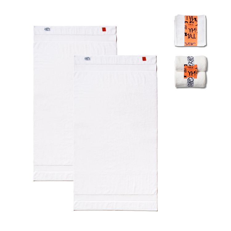 Set of white towels with orange and black text on a white background