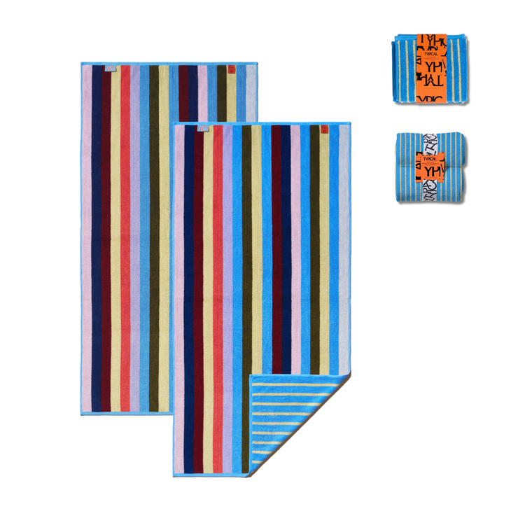 Colorful striped towel with a smaller folded towel on a white background