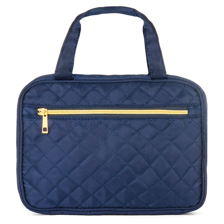 Navy quilted handbag with a gold zipper on a white background
