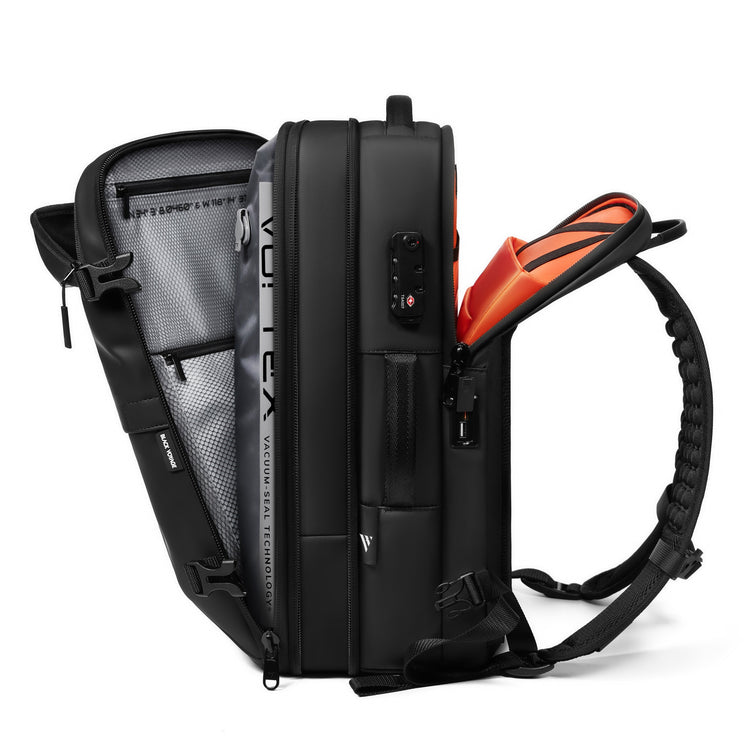 Black backpack with orange interior on a white background