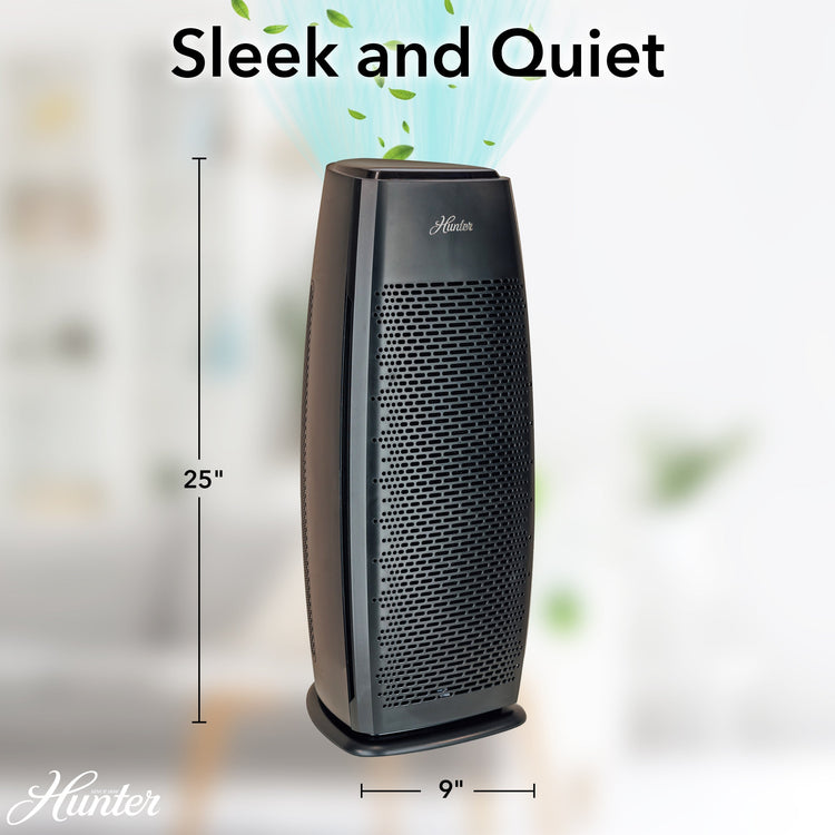 Black air purifier with dimensions labeled, featuring the Hunter brand on a blurred indoor background.